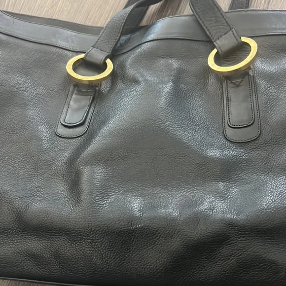 Tiffany and Co. leather handbag in good condition. Gold hardware Zipper closure